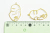 Pendentif visage laiton brut, fournitures pour bijoux, laiton brut ,bijoux moderne,43x26mm, x1, G3183